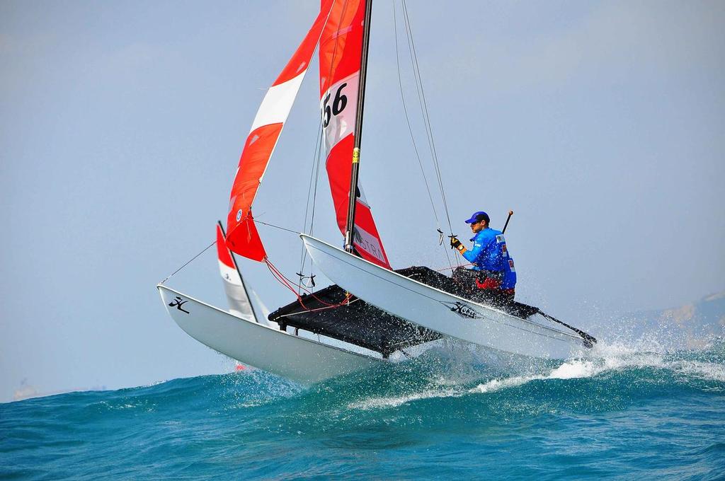 Tom Nunan and Gabriel Kicks one of the strongest local teams had to retire after a bad whipeout  (1) - VISTRA Hobie Asian Championship 2014 © Peter Kuoo